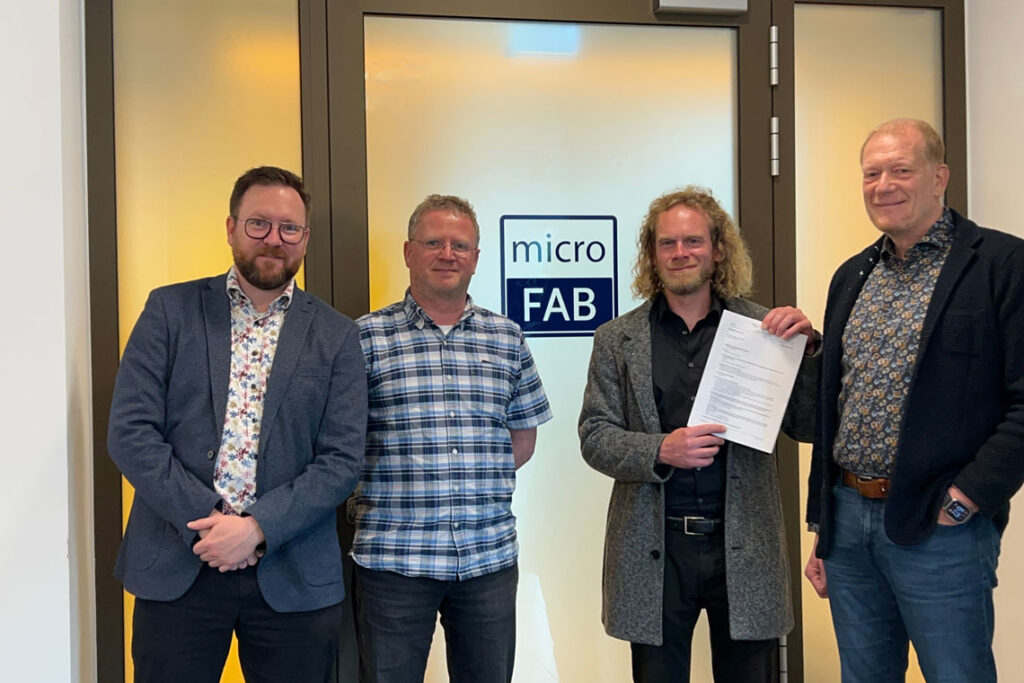 The Founders of Photonics Foundry Aljoscha Schuh, Erik Beckert and Simon Kibben with Thomas Stärz, co-founder of the microfab GmbH. (From left to right)